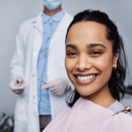 Woman smiling while visiting Califon dental office