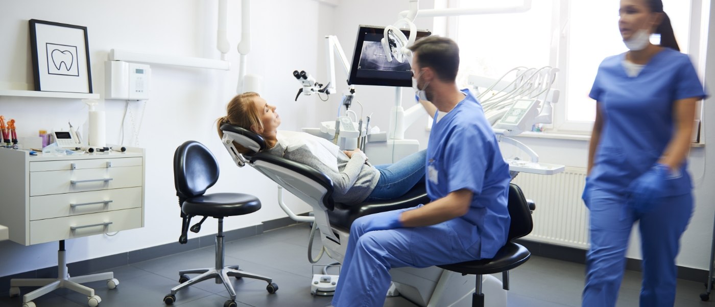 Califon dentist showing a patient x rays of their teeth