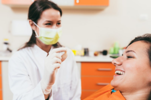 Patient happy to be pain-free after tooth extraction